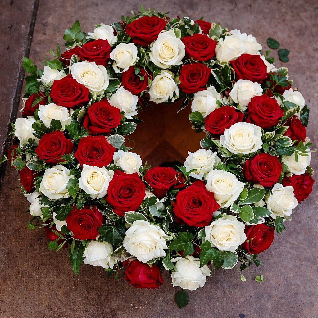 Trauerkranz in Rot und Weiß